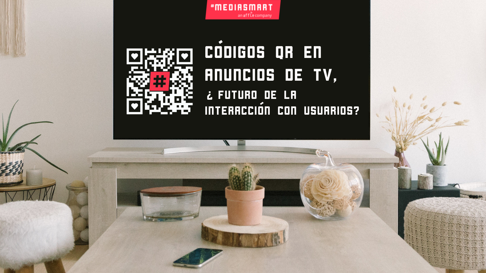 código QR dentro de una televisión en un salón con el título del artículo
